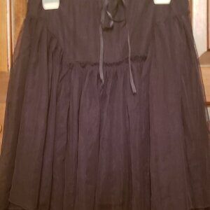 Ladies' Sz. M Funkadelic black mini-skirt; pre-owned; thin overskirt; polyester